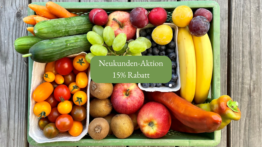 KI generiert: Bunte Obst- und Gemüsekiste mit Text: "Neukunden-Aktion 15% Rabatt".