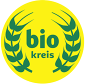 KI generiert: Gelbes Logo mit grünen Ähren und Text: "bio kreis".